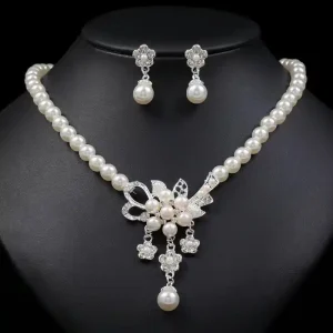 Home a beautiful pearl jewelry set consisting of a necklace and a pair of matching earrings